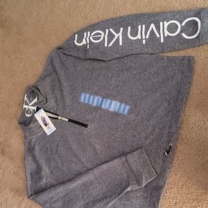 Brand new! Calvin Klein 3/4 zip up grey